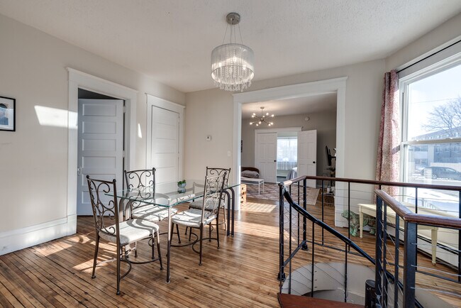 View of dining room, with spiral staircase leading to garden level - 2720 Blaisdell Ave