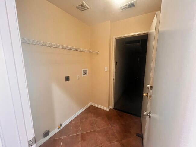 Laundry room and garage access - 1126 Latigo Cv