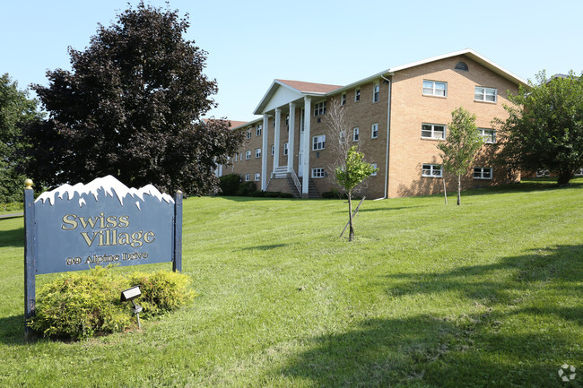 Building Photo - Swiss Village Apartments