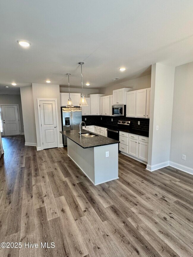 Foto del edificio - 1404 Hartley Ln