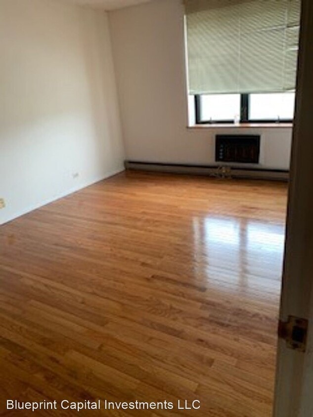 Building Photo - 9078 W Heathwood Dr