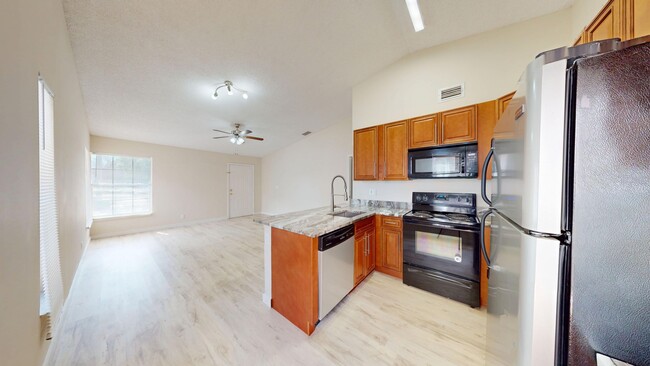 Building Photo - 2BD/1BA Villa w/ Updated Kitchen and w/ HO...