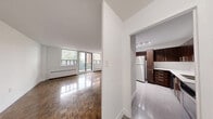 This well-appointed 2-bedroom, 1-bathroom unit at 28 Helene Street North in Mississauga offers a comfortable and functional layout across a single floor. The living room is a bright, open space highlighted by large windows that flood the area with natural light and provide views of the surrounding neighbourhood. Polished parquet wood flooring flows throughout the living areas and bedrooms, lending warmth and character to the space. Sliding glass doors lead to a private balcony, offering an outdoor retreat with views of the tree-lined residential surroundings. The kitchen is thoughtfully designed with rich dark wood cabinetry, white subway tile backsplash, stainless steel appliances including a full-size refrigerator and dishwasher, and light-toned tile flooring. The primary bedroom features a mirrored sliding closet and a window with neighbourhood views, while the second bedroom also benefits from natural light and baseboard heating. The bathroom is finished with neutral beige wall tiles surrounding a full soaker tub and shower combination, complemented by clean white tile flooring and a vanity. Baseboard heating is present throughout the unit, ensuring year-round comfort in this well-located Mississauga residence.