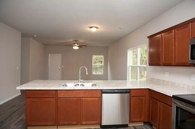 Building Photo - 4-Bedroom, 2-Bathroom West Fayetteville Home with fenced in backyard and 2x car garage - AVAILABL...