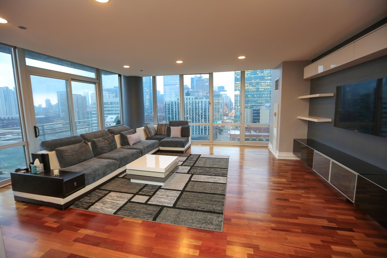 Living room- wrapped floor to Ceiling Windows - 737 W Washington Blvd