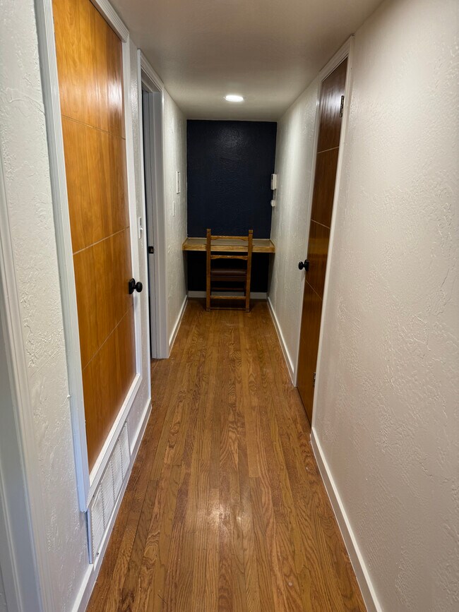 Hallway with built-in desk - 6718 Sundown Ct