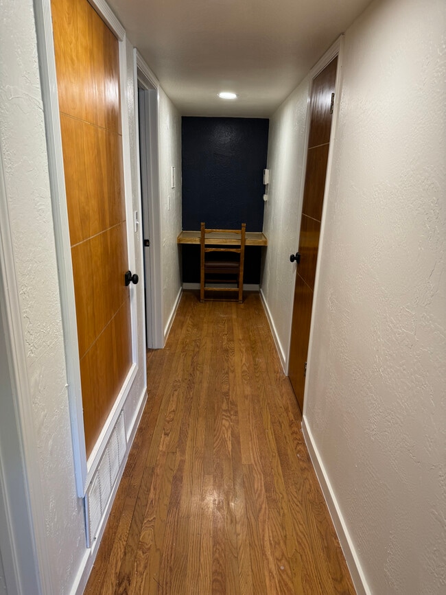 Hallway with built-in desk - 6718 Sundown Ct