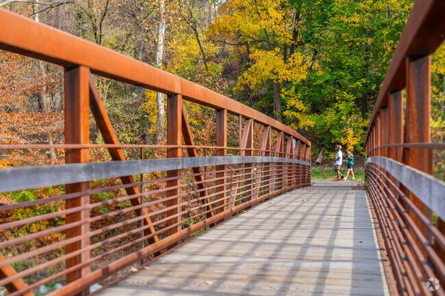 A foot bridge crosses Bushkill Creek to access Karl Stirner Arts Trail.