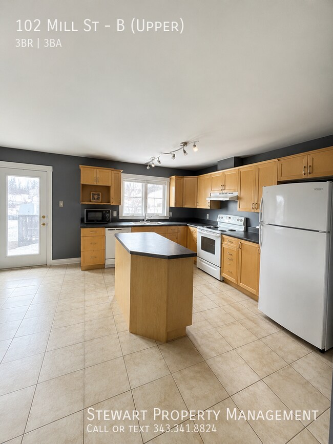 Photo du bâtiment - 102 Mill St
