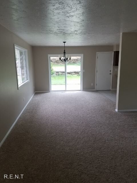 Building Photo - 4 br, 2.5 bath House - 8355 S Mesa Dr.