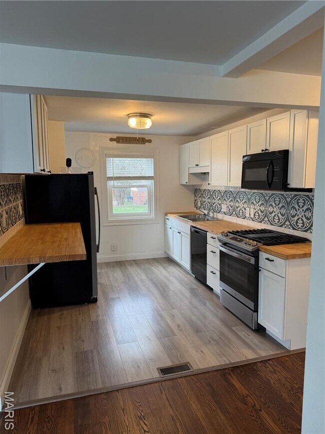 Foto del edificio - 1119 NORTH MCNIGHT ROAD | UNIVERSITY CITY 63132