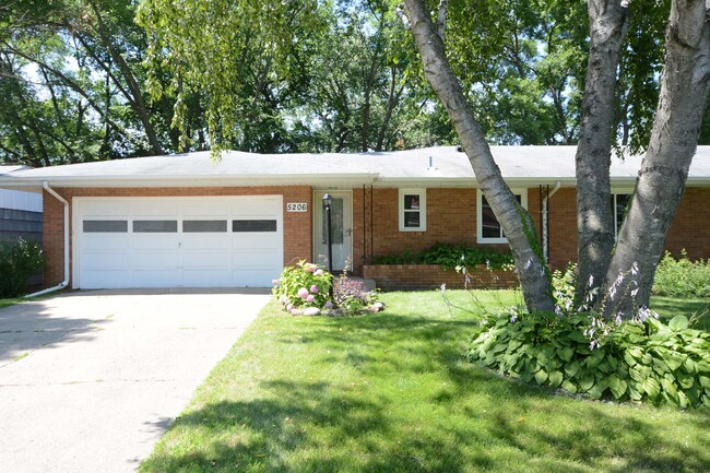 Welcome home to private drive way and two-car attached garage! - 5206 Grandview Ln