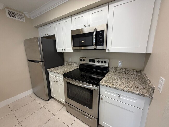 Building Photo - ANNUAL RENTAL - 2 BED / 2 BATH CONDO AT MYSTIC GARDENS