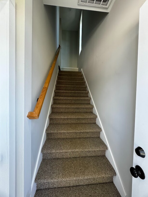 Building Photo - "Spacious 1-Bedroom, 2-Bath Apartment with...