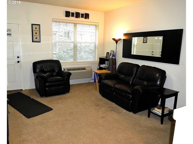 Building Photo - Comfortable Ground-Level 2-Bedroom Condo –...