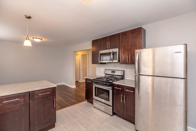 Building Photo - Large Newly Rehabbed Garden Apartment with...