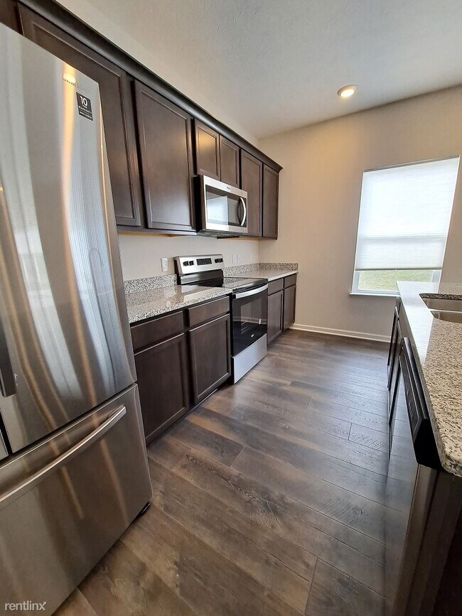Foto del edificio - 4 br, 2.5 bath House - 5160 Buttercup Dr
