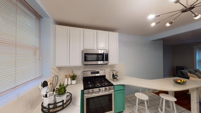 Foto del edificio - Bright Ravenswood apartment near Andersonv...