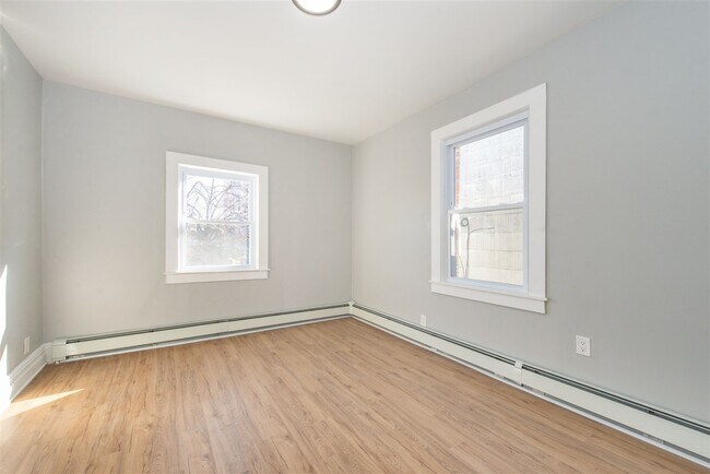 Building Photo - 1703 Manhattan Ave