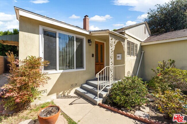 Building Photo - 7466 Denrock Ave