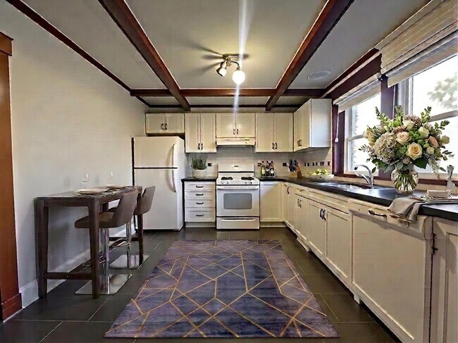 Building Photo - Stunning 2 Bedroom Garden Terrace Suite!
