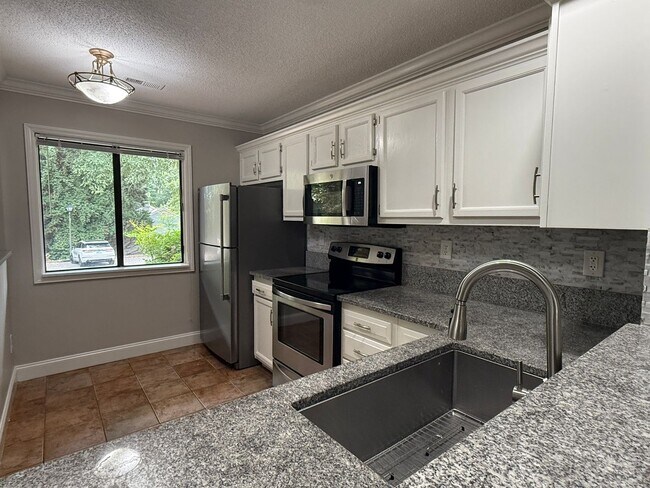 Foto del edificio - Two Bedroom Townhome located on Golf Course