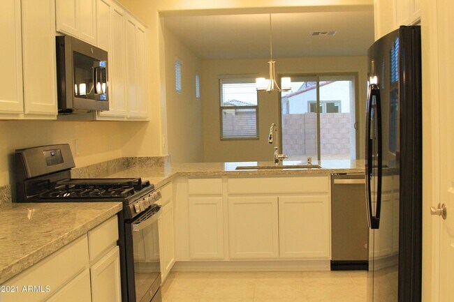 Building Photo - 5418 W Country Garden Ln