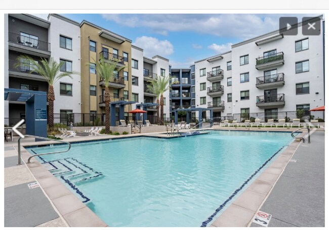 Building Photo - 8688 E Raintree Dr