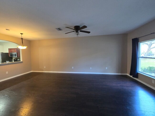 Building Photo - Great Town Home in Gated Community with Pool and Pond View