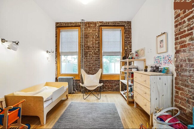 Bedroom or office. High ceilings, central air, garden views. - 1876 DeKalb Ave