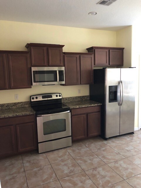 Building Photo - 4110 Shadetree Ln