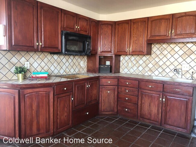 Building Photo - 4 br, 3 bath House - 25409 Community Blvd.