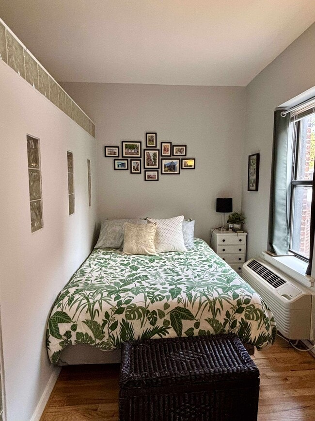 Bedroom area with multiple windows and recently rennovated HVAC unit - 1413 T St NW