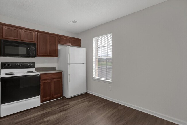 Building Photo - Pre-Leasing Now 3 bedroom townhome with fe...