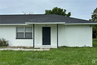 Building Photo - 953 NE Pine Island Ln