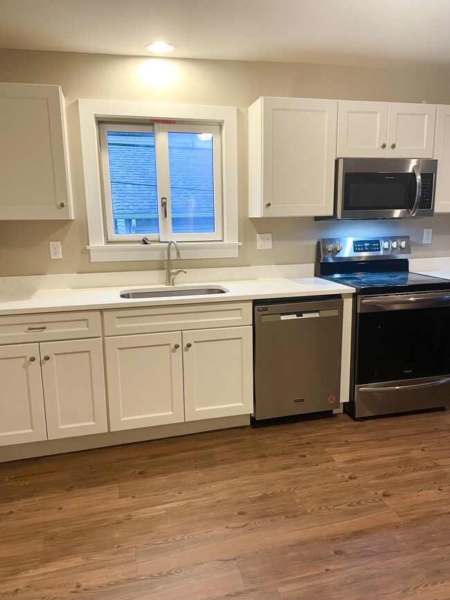 Oversized sink and new cabinets - 540 Thames St