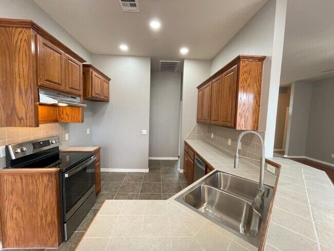 Building Photo - All brand new inside! Beautiful flooring w...
