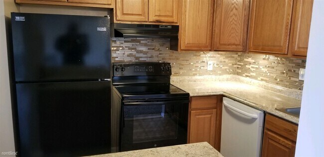 Building Photo - 2 br, 2 bath Condo - 10137 Prince Pl Apt 401B