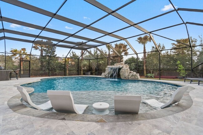 Building Photo - Luxury 4BR/3.5BA Home with Private Heated Pool & Outdoor Oasis in Hammock Bay, Freeport!