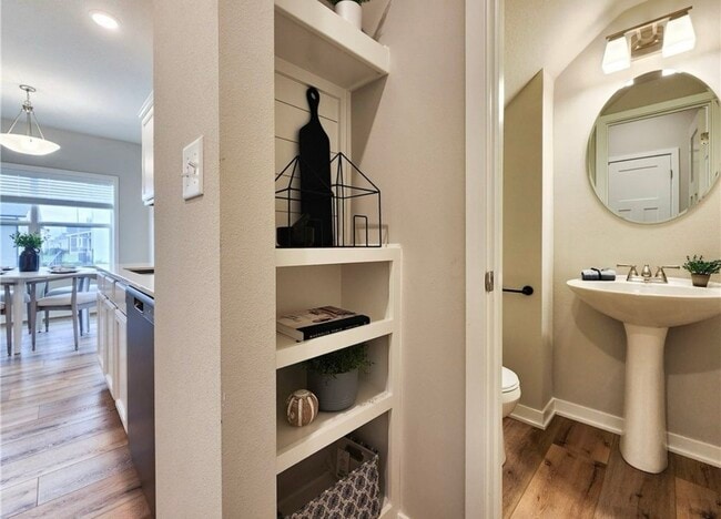 Half bathroom right off kitchen and garage - 4032 NE Timber Ln