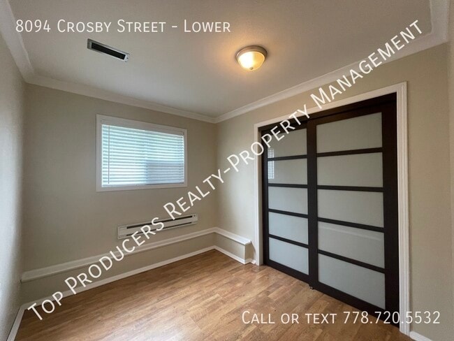Photo du bâtiment - Bright 1 Bedroom Ground Level Suite