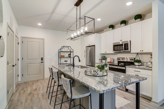 Building Photo - The Tomlin Luxury Apartments