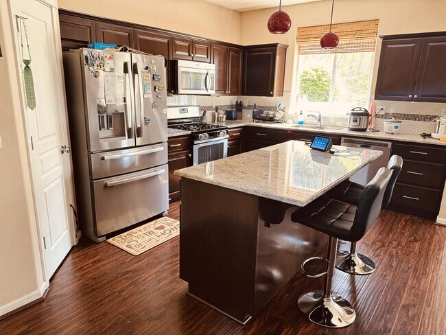 Building Photo - 5595 NE Azores Ct