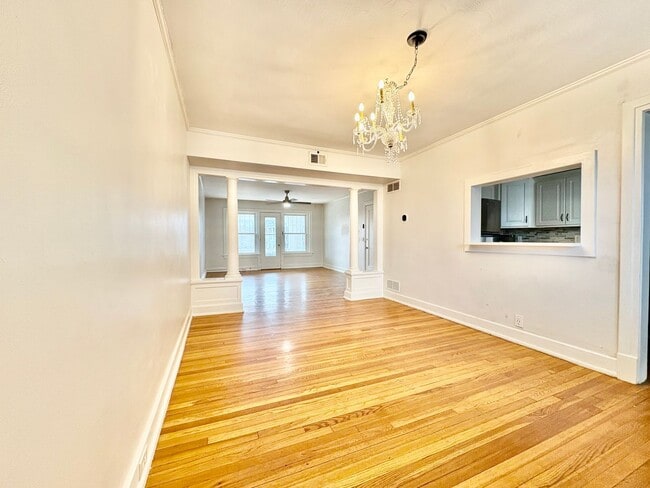 Building Photo - Top-Floor 2 Bedroom Condo in Gated Community with Huge Balcony & Elegant Marble Bath