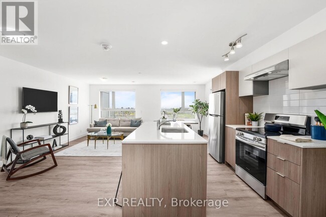 Building Photo - 100-100 Manett Crescent