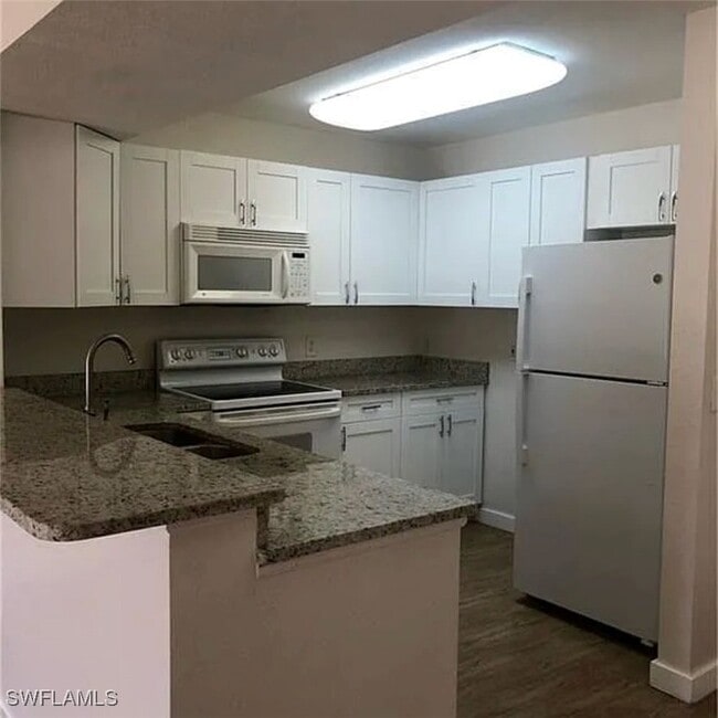 Building Photo - 8304 Key Royal Cir