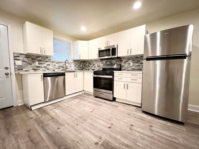 Updated 2BR house with off street parking! - Updated 2BR house with off street parking!