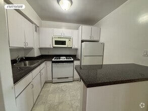 Building Photo - 42-25 65th Pl