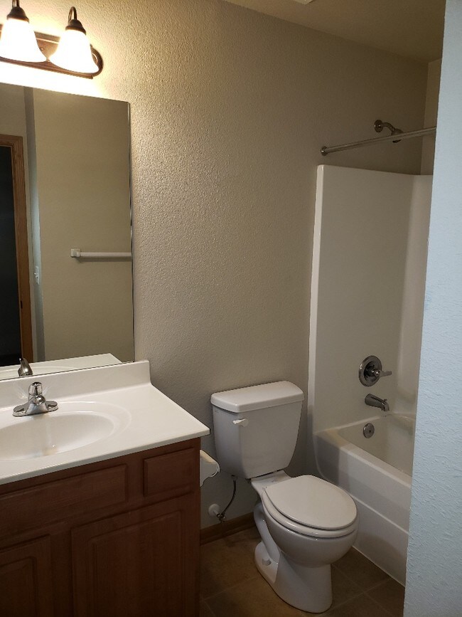 secondary bathroom - 111 SW Rose Garden St