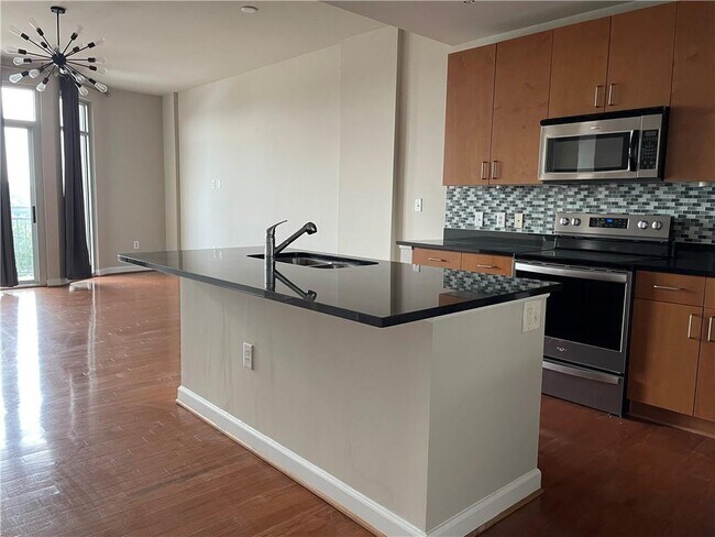 Building Photo - 711 Cosmopolitan Dr NE